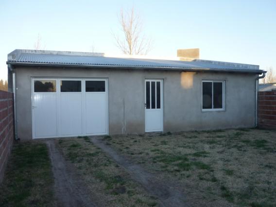 CASA CON GARAGE - QUINCHO Y AMPLIO PATIO